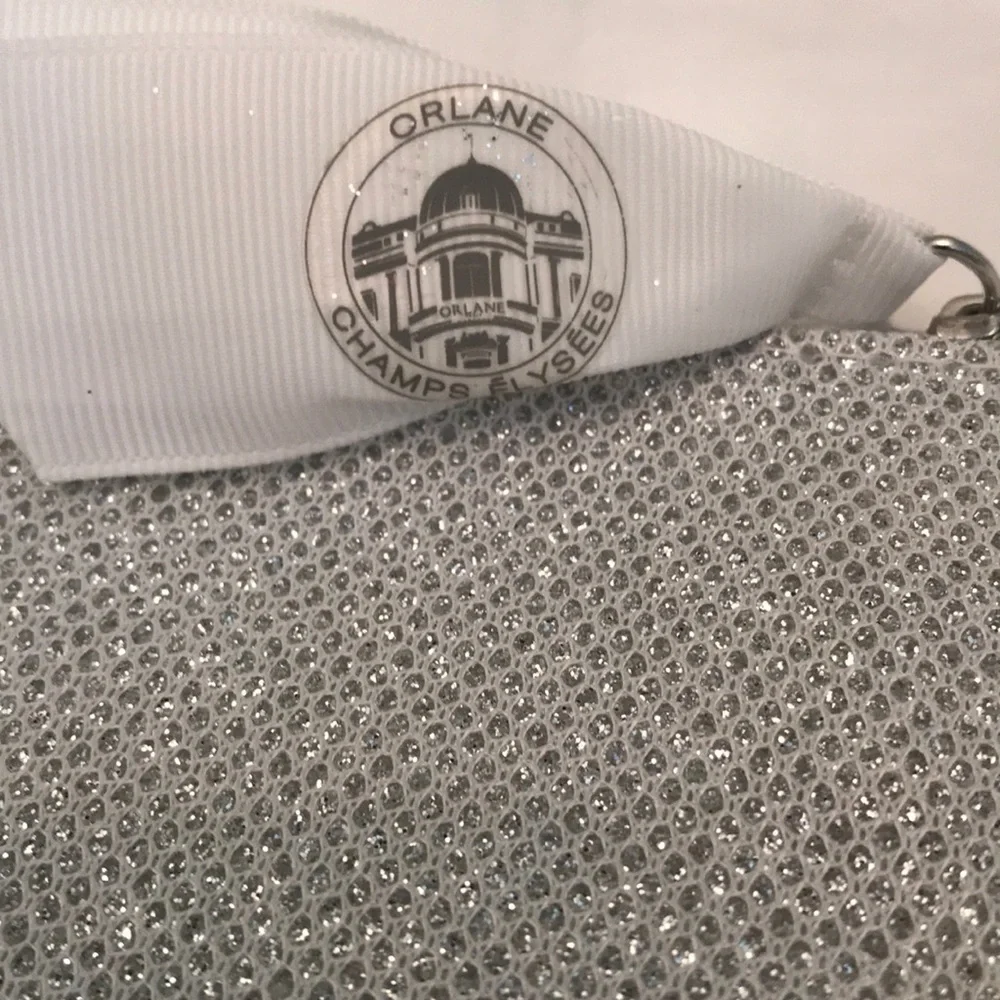 NWOT Orlane Paris silver sparkly cosmetic pouch